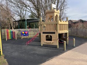 Wooden play castle in Essex playground 