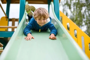Child playing in nursery playground